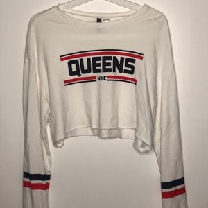 •A cropped sweater•